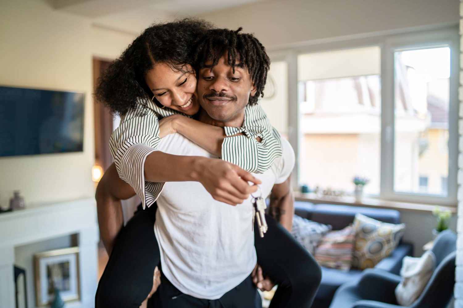 Resident couple having a good time in their apartment at Legacy Trace in Benson, North Carolina