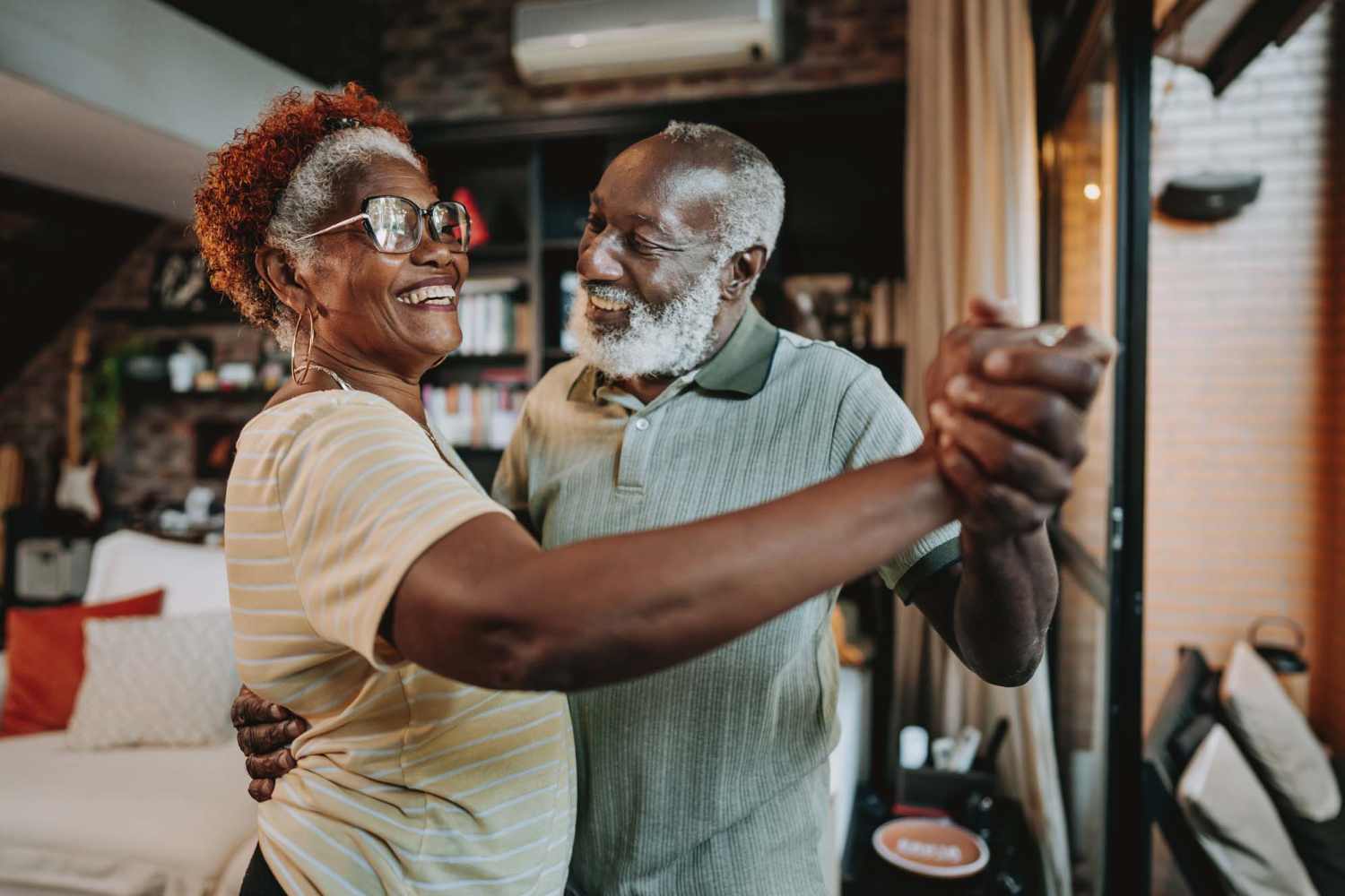 Senior couple dancing together at The Lofts At Union Crossing in Gastonia, North Carolina