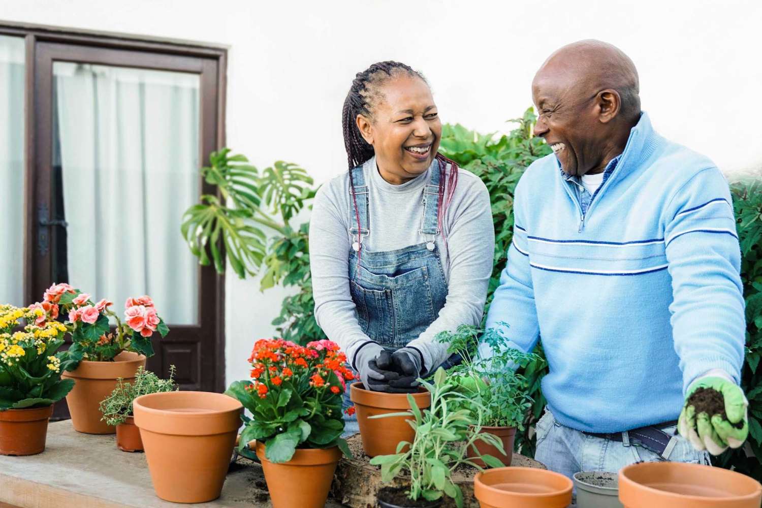 Resident couple enjoying the community view at Bramblewood in New Haven, Michigan