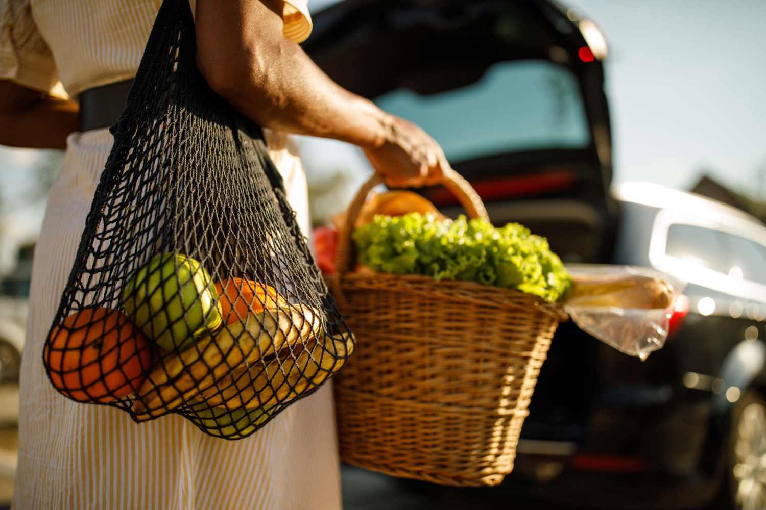 Resident woman shopping groceries in the neighborhood at Woodstock Square in Joshua, Texas