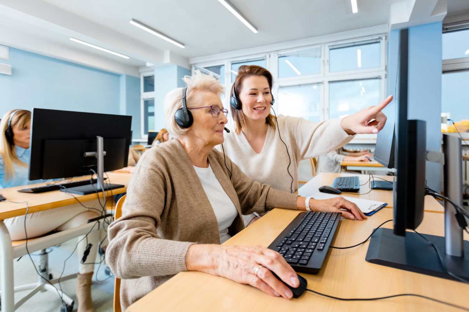 Resident doing online payments at Heirloom at Pebble in Las Vegas, Nevada