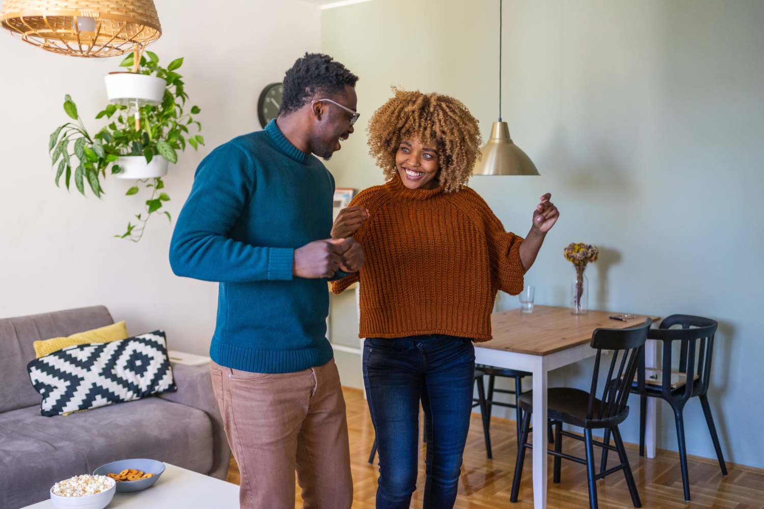 Resident couple dancing in their living room at Filbin Creek in North Charleston, South Carolina