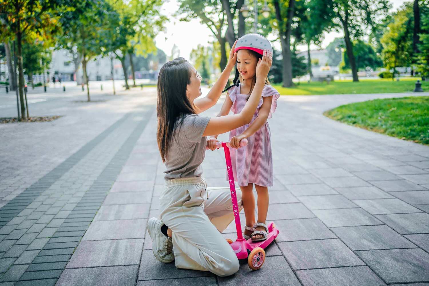 Resident and her kid playing in a park near 300 Optimist Park in Charlotte, North Carolina