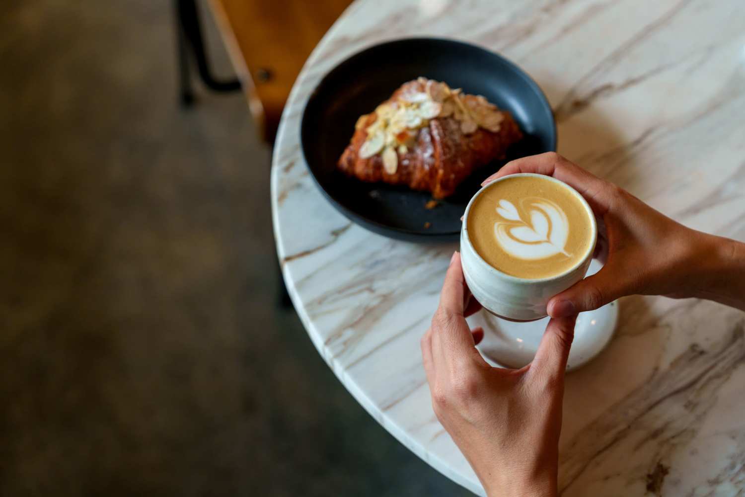 Resident grabbing coffee from a cafe near Niner Woods in Charlotte, North Carolina