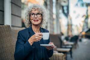 Resident having coffee near Crestview Senior Duplexes in Tulsa, Oklahoma