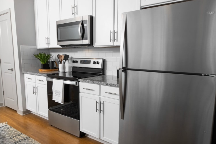 Modern kitchen with stainless-steel appliances in a nice home at Parc at Murfreesboro in Murfreesboro, Tennessee