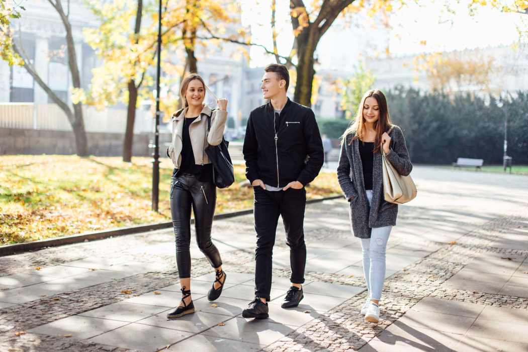 A group of friends walking near Reno Experience District, Reno, Nevada