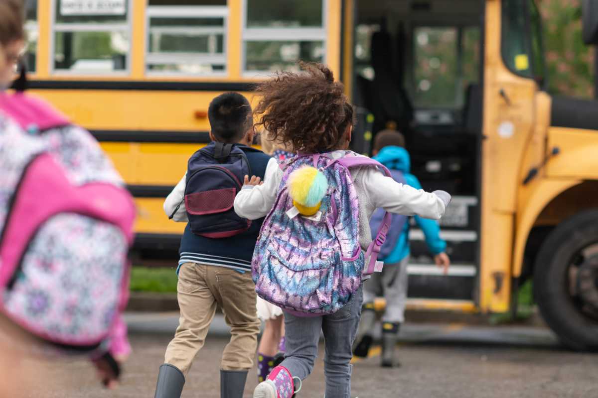 School bus picking up the kids for school at Fountain View Apartments in Indianapolis, Indiana