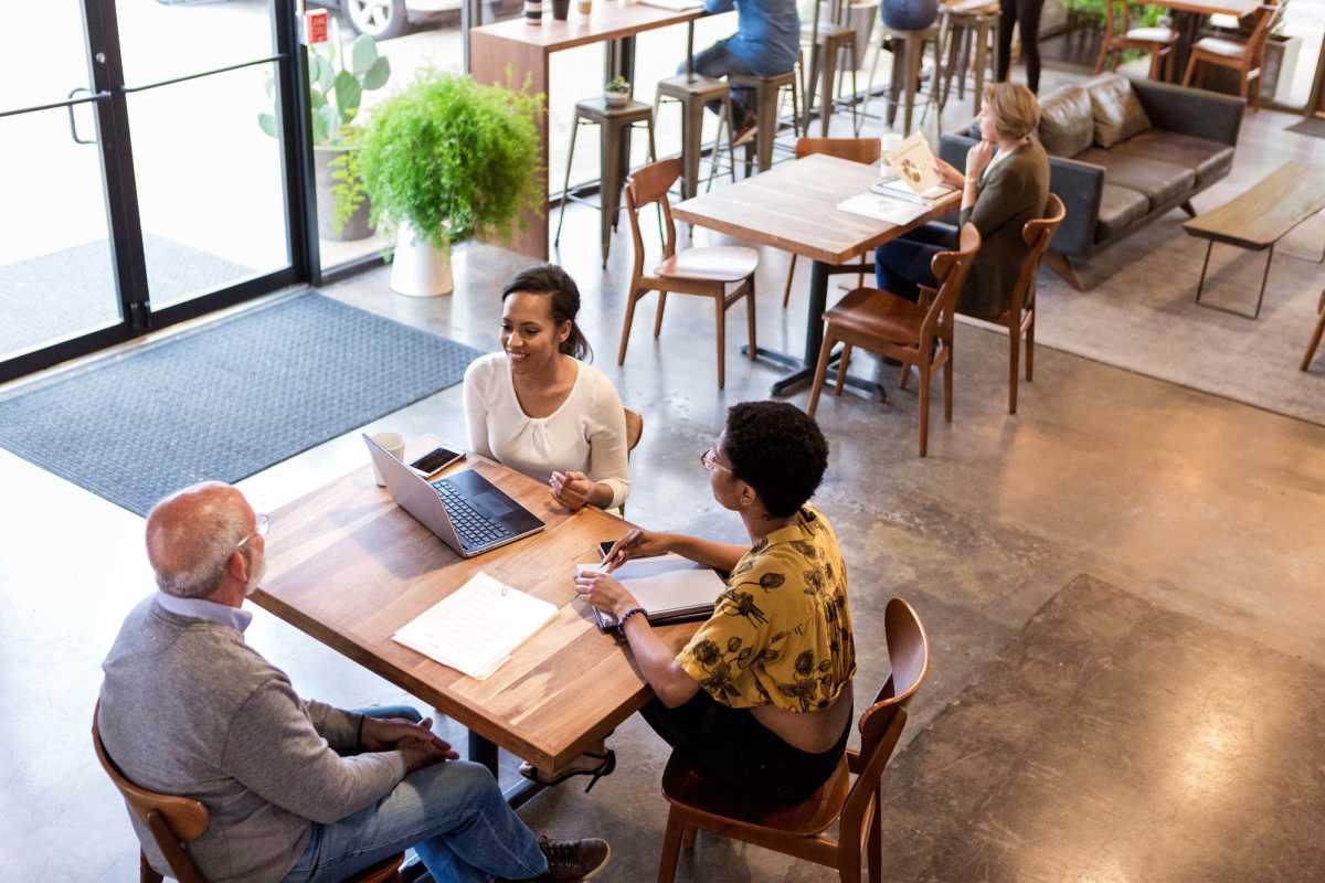 Residents discussing at Brookstone Senior Apartments in Louisville, Kentucky