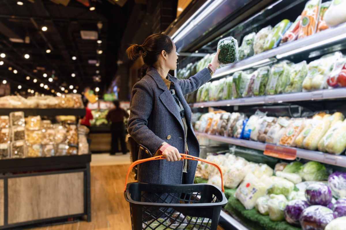  Resident buying grocery in a supermarket near Nottingham Village in Gardner, Kansas