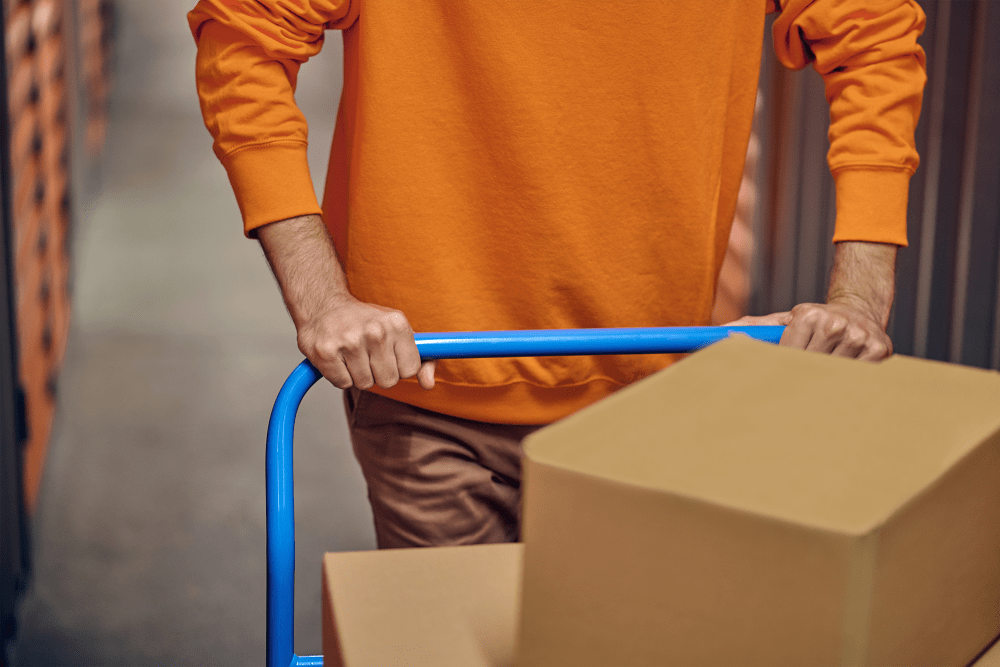 A customer moving items to his unit at BuxBear Storage Hayden in Hayden, Idaho