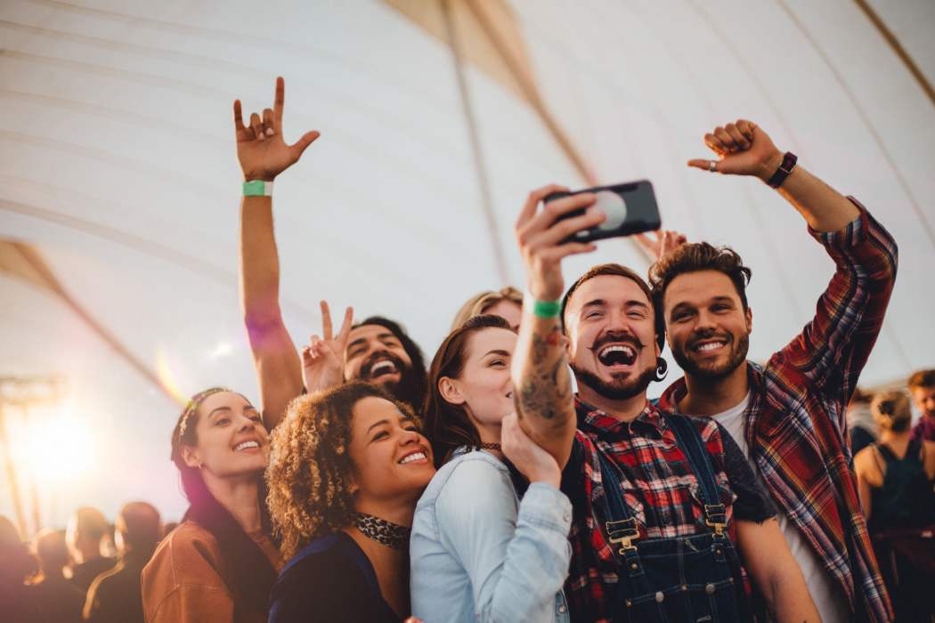 A group of friends take a selfie at an event near The Ellison, Las Vegas, Nevada