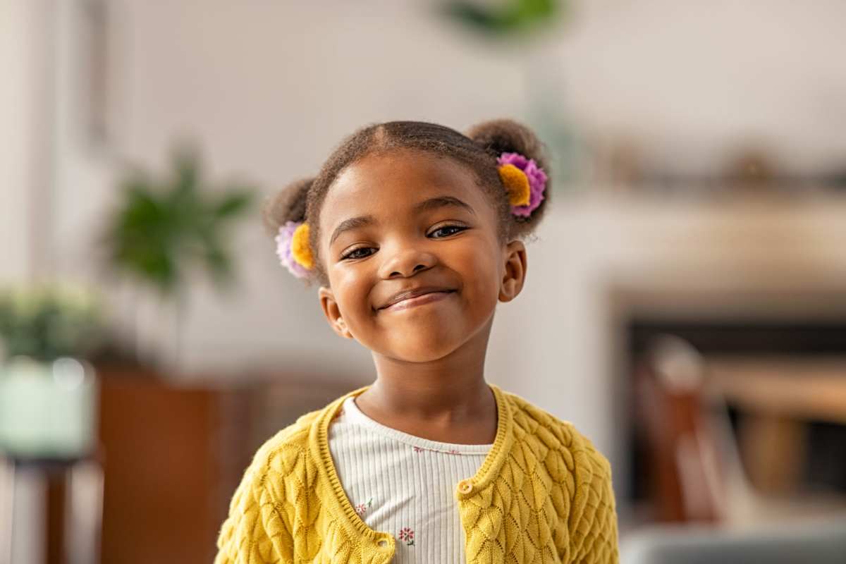 Child smiling at 313 RACE in Philadelphia, Pennsylvania