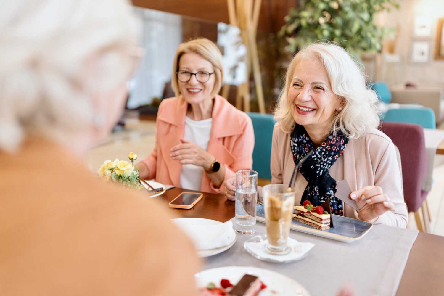 Residents enjoying their snacks in a restaurant near Whispering Pines in Grayling, Michigan