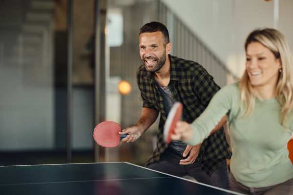 Residents playing table tennis in the clubhouse at The Bungalows at Sky Vista in Reno, Nevada