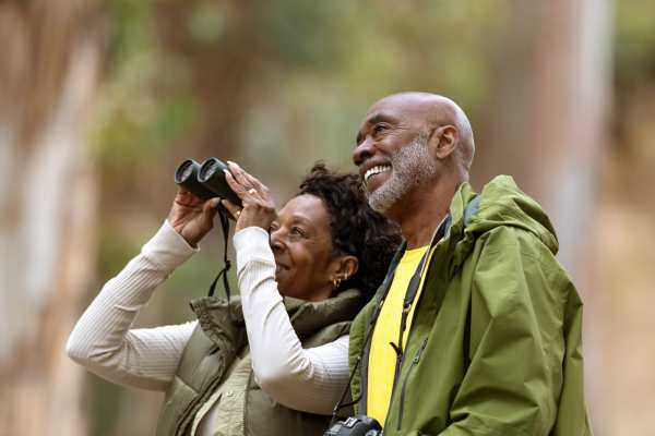 Senior couple exploring the outdoors near Whispering Pines in Grayling, Michigan