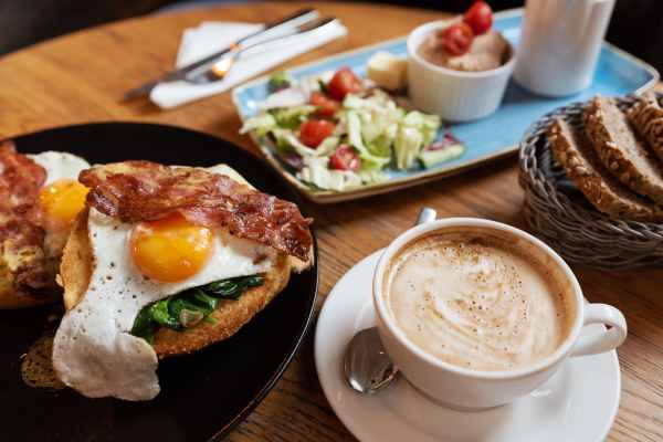Breakfast plate with eggs, bacon, and salad near Pritchard Park Place in Racine, Wisconsin