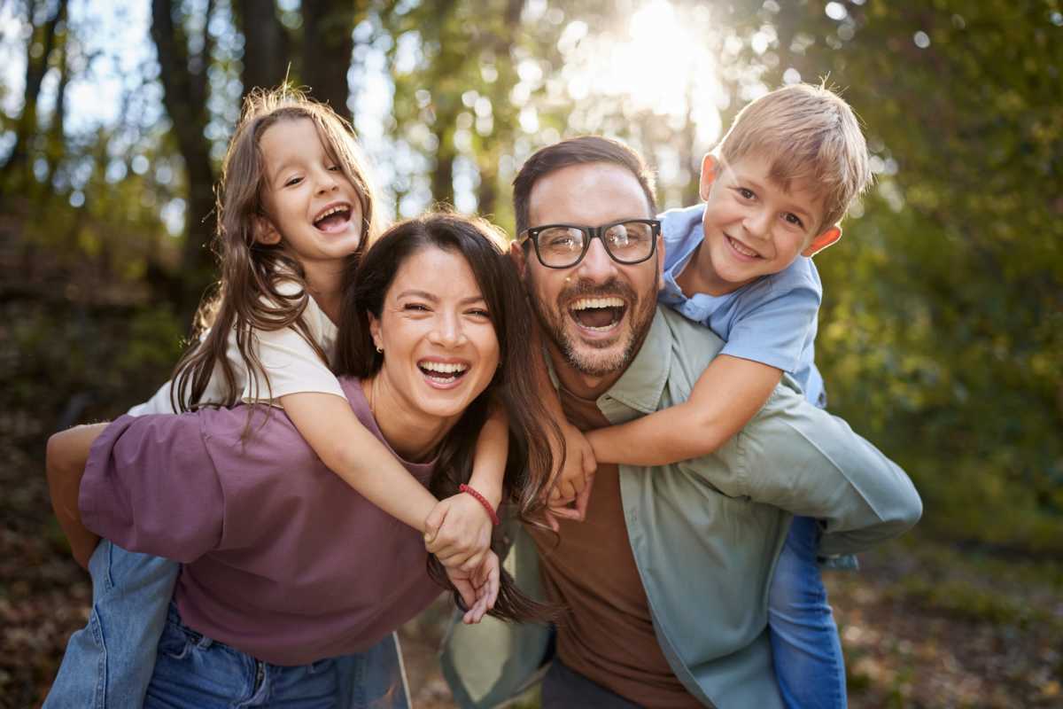 Happy family in the park near Riverside Park in Early, Texas