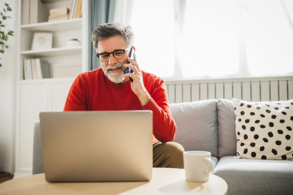 Cozy workspace with laptop, coffee, and a relaxed conversation atmosphere at Villas At Alexander Bay in Baytown, Texas 