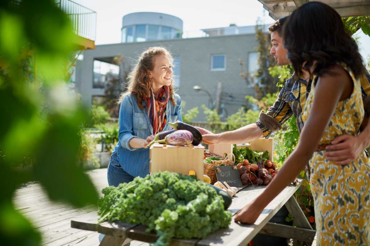 Residents buying vegetables nearStoney Run Townhomes in Columbia, Maryland 