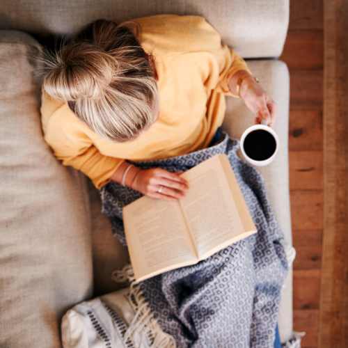 Resident reading in her home at Waterstone Terrace in Benicia, California