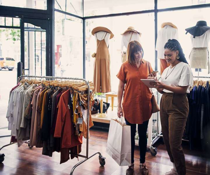 Resident shopping at a clothing boutique near Redland Arms Apartments in Florida City, Florida