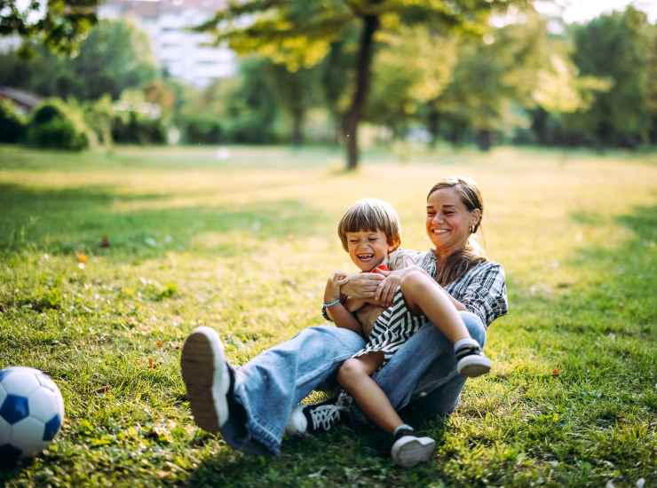 A happy mother with her child at a park near Norco Valley Square in Norco, California
