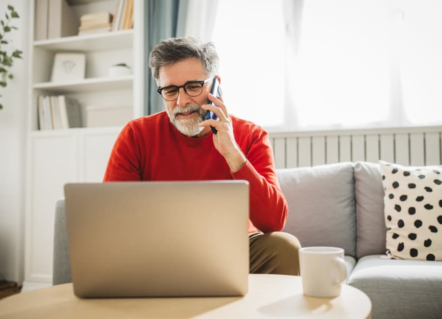 Resident working on his laptop at The Residences at Thomas Circle in Washington, District of Columbia