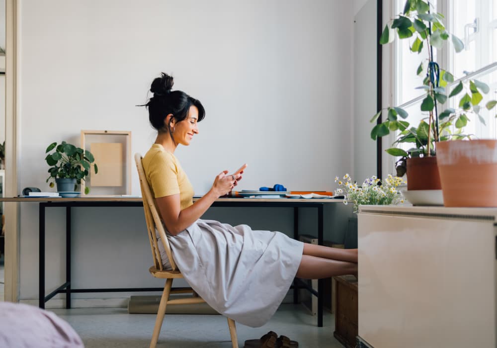 A resident relaxes in her apartment at The Marke Apartment Homes in Santa Ana, California