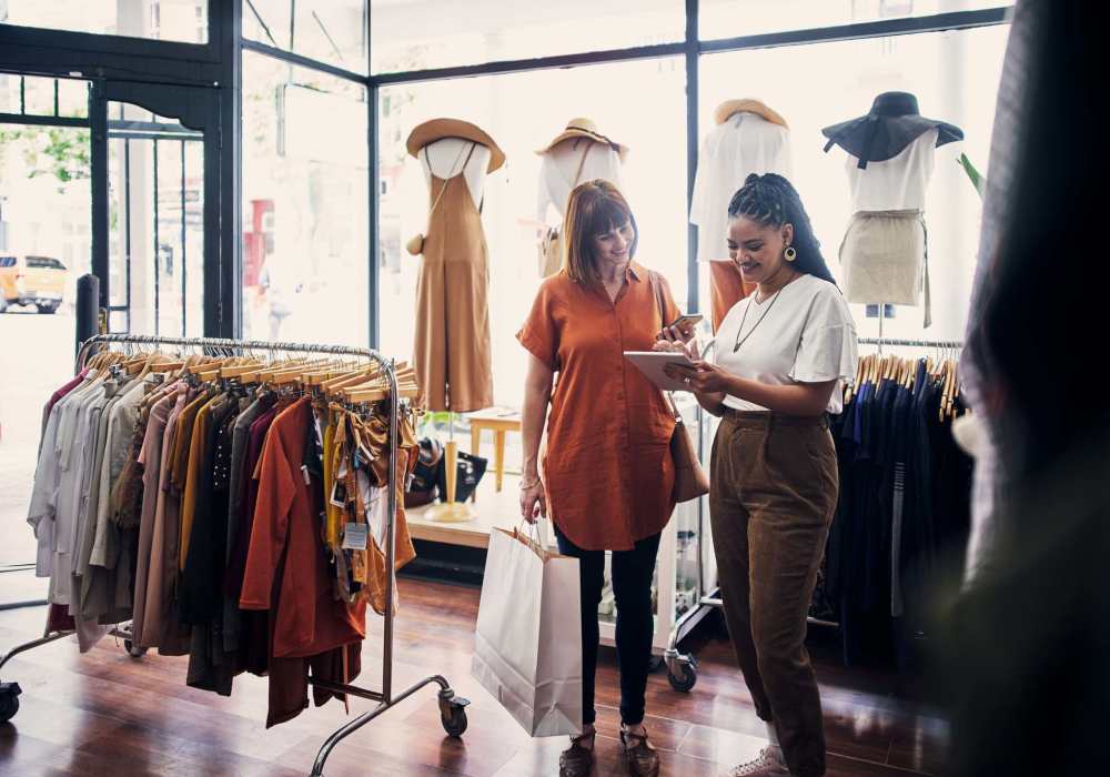 Woman shopping in a nearby boutique at Cotton Wood Apartments in Dublin, California