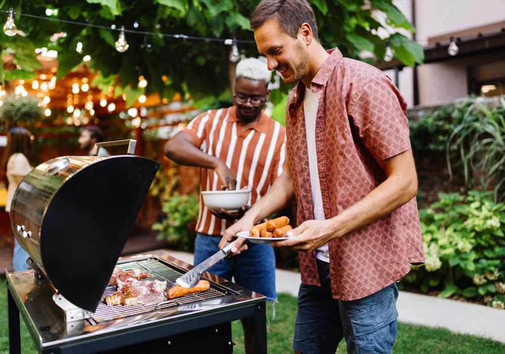 Resident cooking outside  at The Quorum At Trophy Club in Trophy Club, Texas