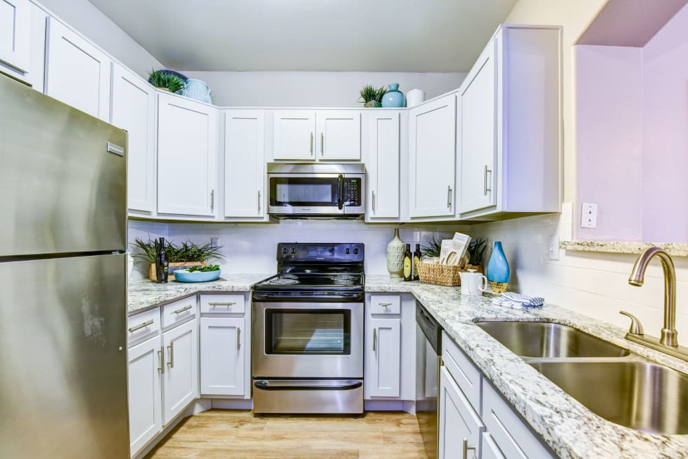 A kitchen in one of the apartments at Timberlakes at Atascocita in Humble, Texas