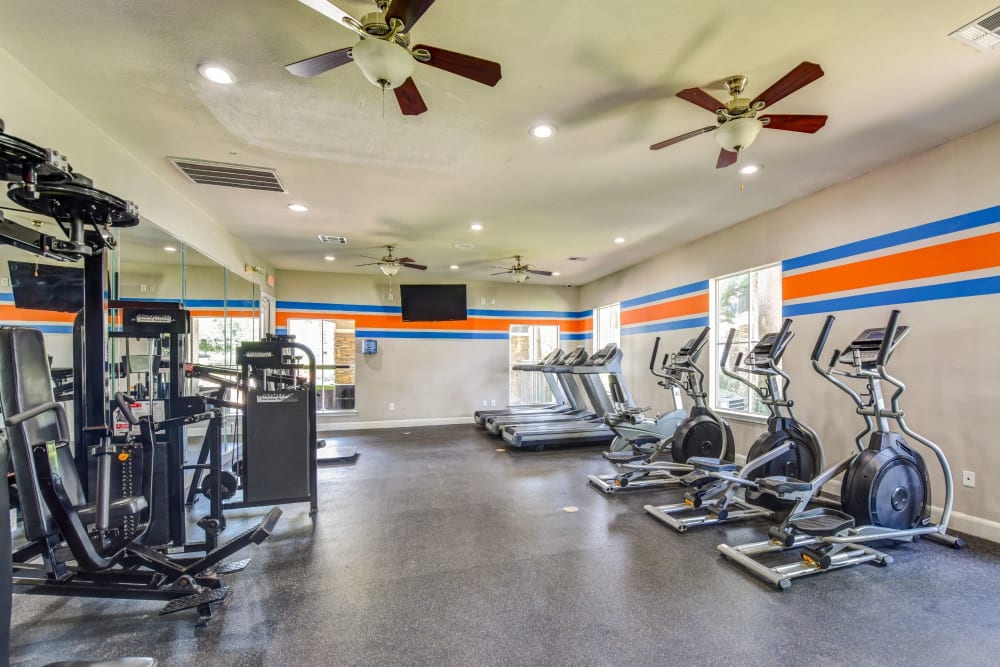 Fitness center with modern equipment at Timberlakes at Atascocita in Humble, Texas