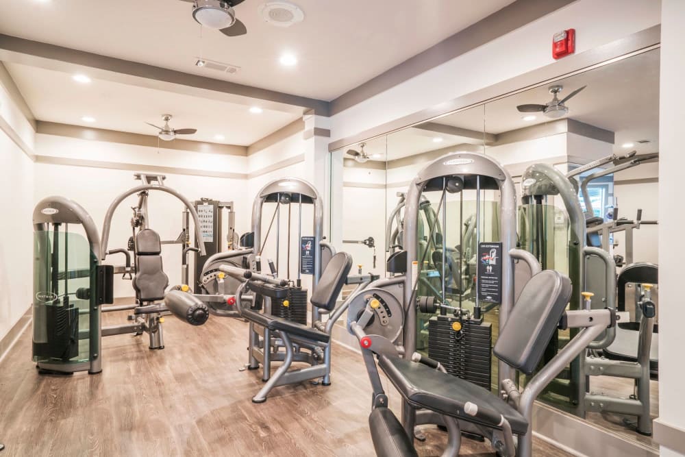 Large fitness center at Two Blocks Apartments in Dunwoody, Georgia