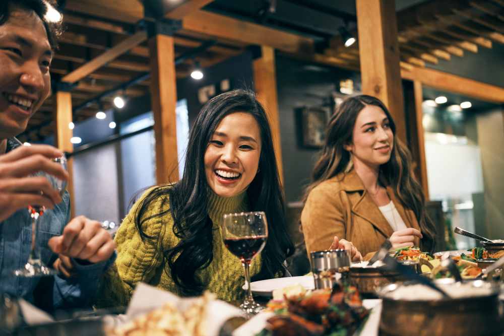 Residents enjoying their meal in a restaurant near Heron Creek Apartments in Moses Lake, Washington