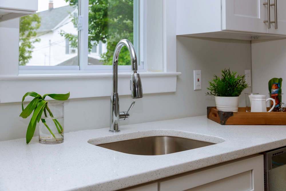Close up of kitchen with stainless-steel sink at Cypress Point Apartments in Shawnee, Oklahoma