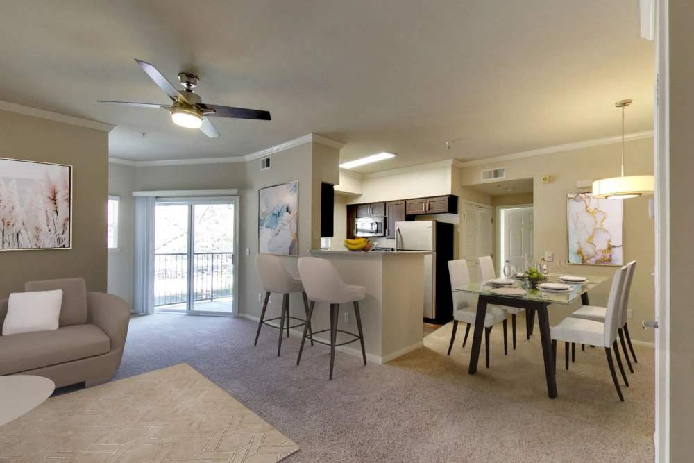 Dining near kitchen and connected to living at Hawthorn Village Apartments in Napa, California