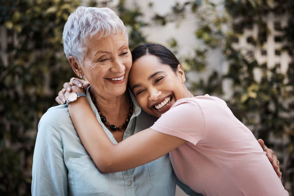 Resident hugging family at Transitions At Home - West in Mount Horeb, Wisconsin