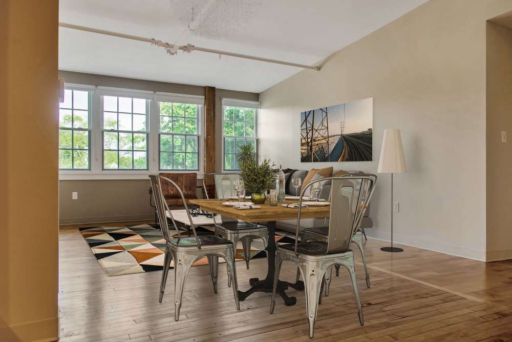 Dining area with wood flooring at Shoe Shop Place in Middleboro. MA