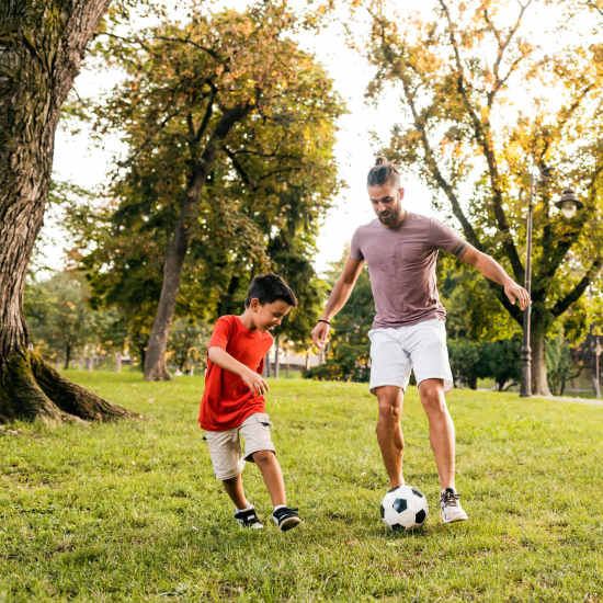 Residents playing at the park at Castlebar Apartments in Bozeman, Montana