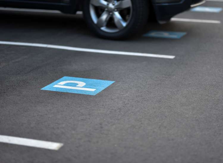 Parking facility area with at Burbank Garden Apartments in Boston, Massachusetts