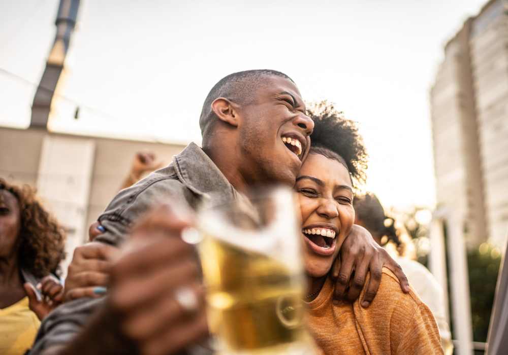 Resident enjoying drinks near Pin Oak Manor Apartments in Mishawaka, Indiana