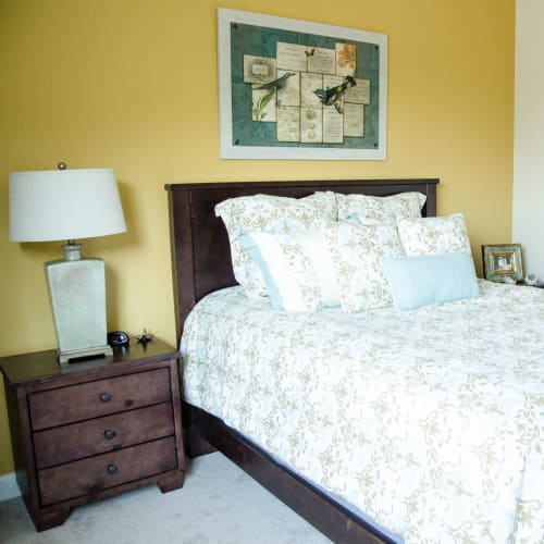 Tranquil bedroom suites available at First & Main of Commerce Township in Commerce Township, Michigan