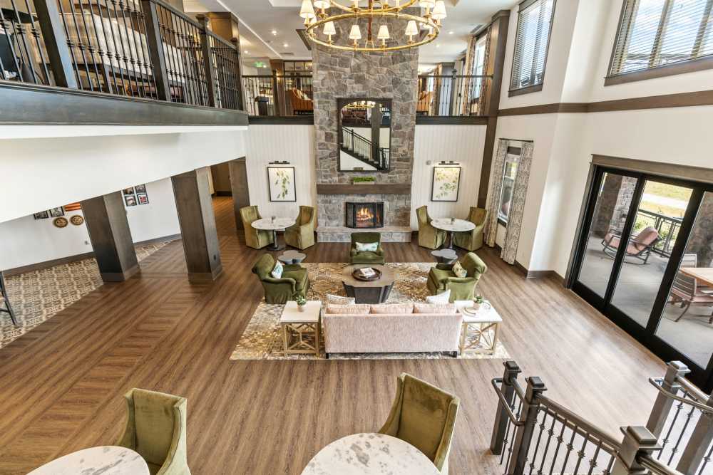 Lobby with fireplace at Amira Choice Arvada in Arvada, Colorado