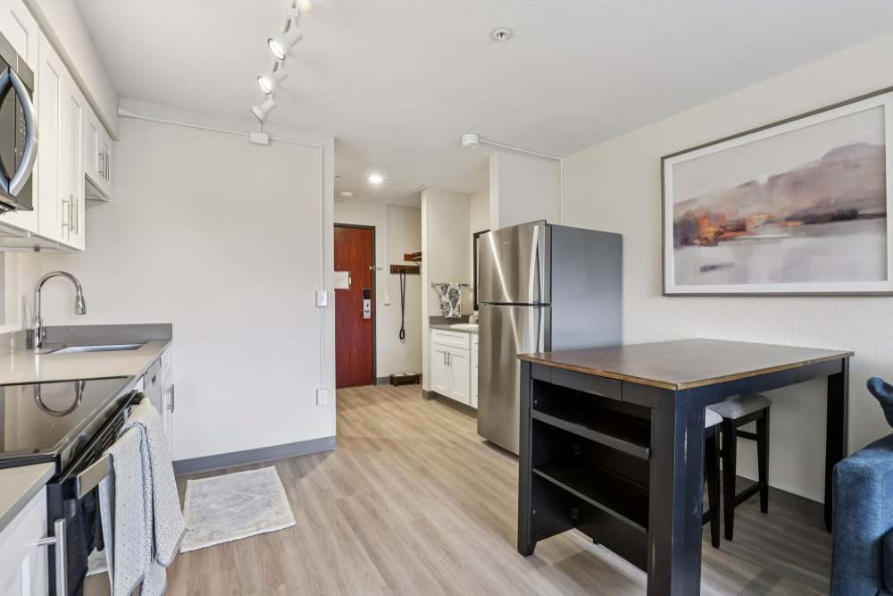 Kitchen and dining area at Woodland Flats in Gresham, Oregon