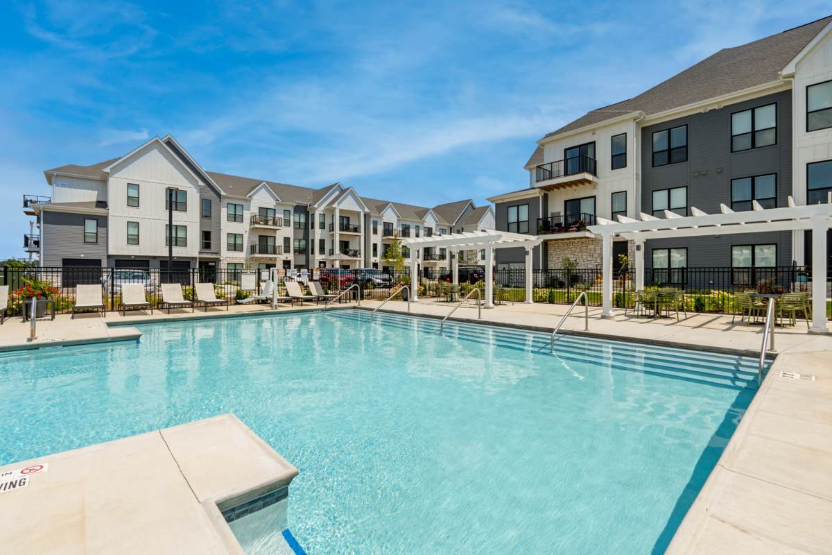 Pool and outdoor lounge at Seasons at Hoffman Estates in Hoffman Estates, Illinois
