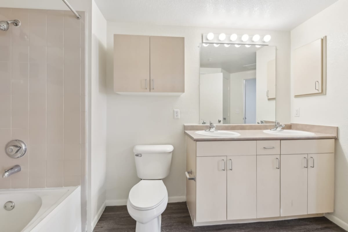bathroom with off-white cabinets