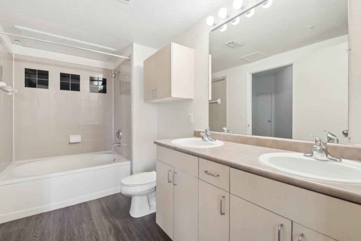 bathroom with off-white cabinets