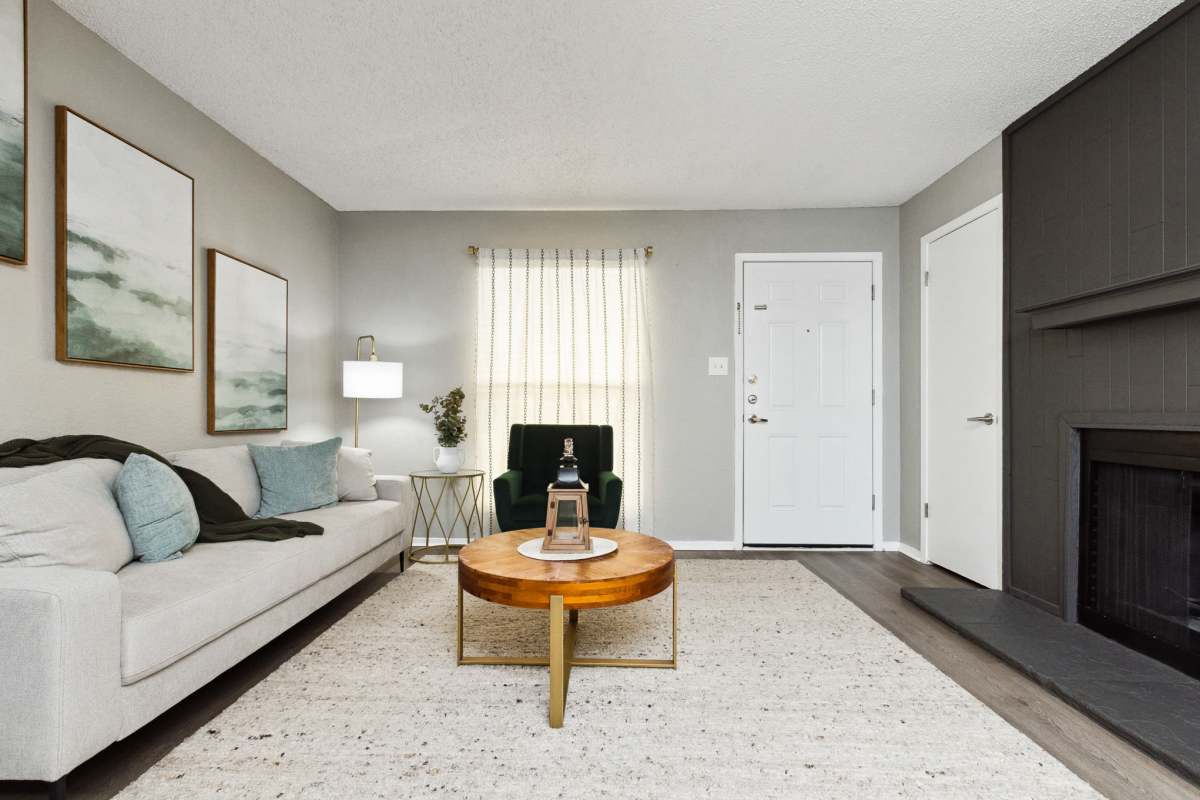 Model living space with fireplace at Creekside in San Angelo, Texas