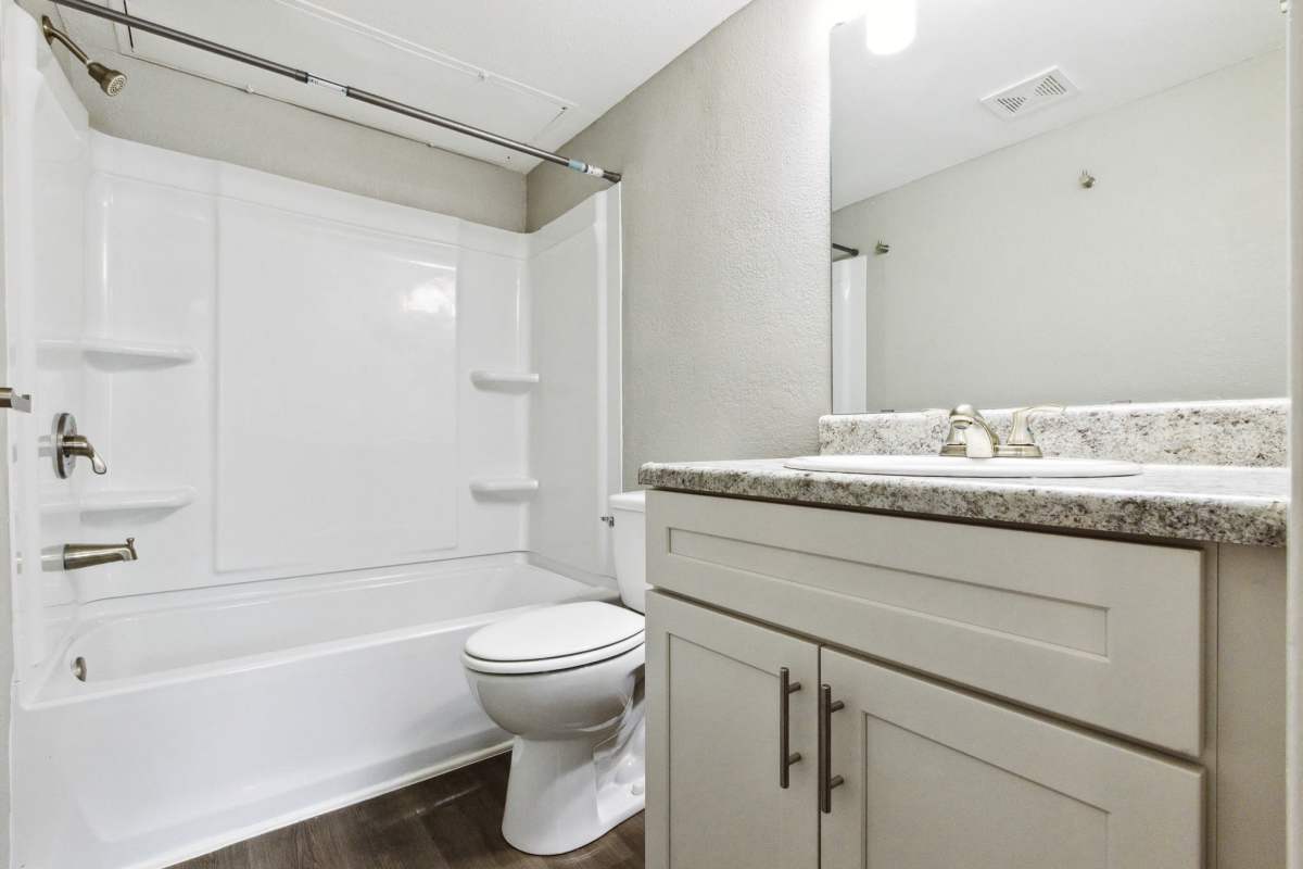 Modern bathroom with shower tub at Creekside in San Angelo, Texas